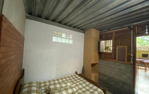Ένα ή περισσότερα κρεβάτια σε δωμάτιο στο Sopo Guesthouse