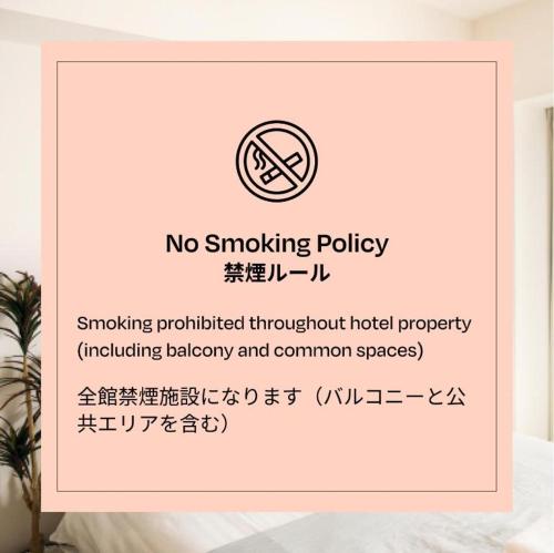a no smoking policy sign in a bedroom at Section L Hatchobori in Tokyo