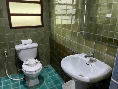 Bilik mandi di Blue Beach Apartment