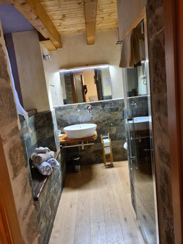 a bathroom with a sink and a mirror at Alpe di Sara in Fiumalbo