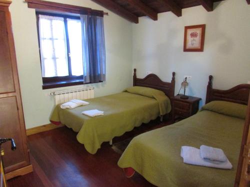 Ένα ή περισσότερα κρεβάτια σε δωμάτιο στο Kerizara Baserria