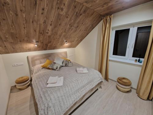 Ένα ή περισσότερα κρεβάτια σε δωμάτιο στο Apartmány “Chaty Krušetnica “
