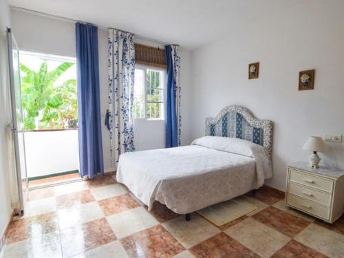 Postel nebo postele na pokoji v ubytování Nerja - Casa Vivi 8