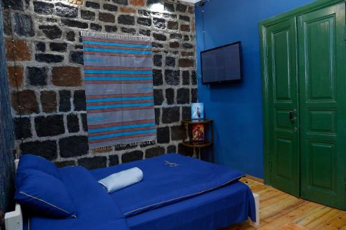 TV a/nebo společenská místnost v ubytování Onoyi Tun Guest House