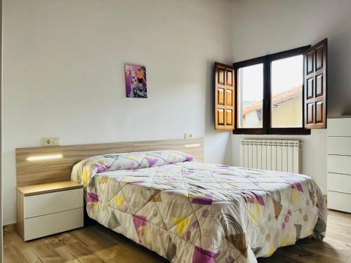 Postel nebo postele na pokoji v ubytování Apartamentos Raíces