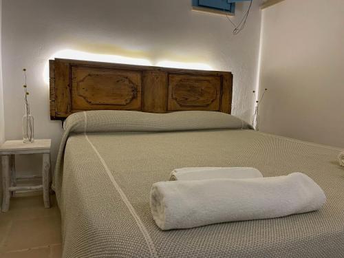 Postel nebo postele na pokoji v ubytování La Corte dei Colori