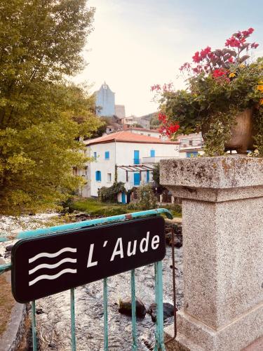 a sign for the l allele in a village at Private riverside villa with breathtaking views in Axat