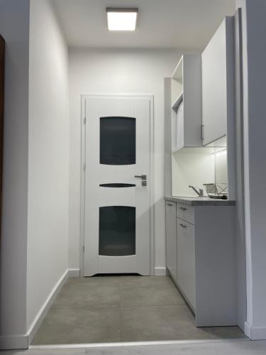 Kuchyň nebo kuchyňský kout v ubytování Apartamenty Wisła Centrum
