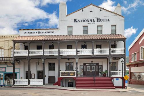 a historic hotel on the corner of a street at National Hotel Jackson, Tapestry Collection by Hilton in Jackson