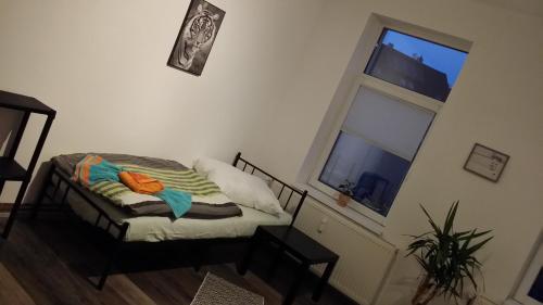 Кровать или кровати в номере Stella's Monteurswohnungen