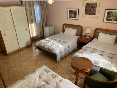 Ένα ή περισσότερα κρεβάτια σε δωμάτιο στο Mas-wadi