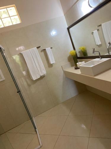 Ein Badezimmer in der Unterkunft Pousada Morro dos Navegantes