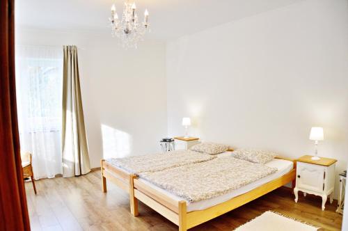 Posteľ alebo postele v izbe v ubytovaní R Cottage Jacuzzival