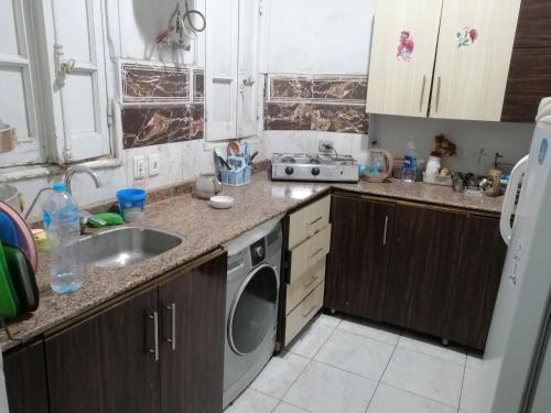 Kuchyň nebo kuchyňský kout v ubytování Gardenia Hotel