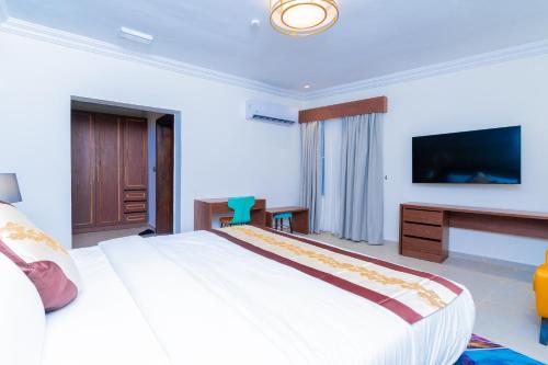 Postel nebo postele na pokoji v ubytování Terraform Hotel