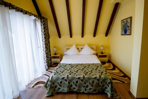 Katil atau katil-katil dalam bilik di Green Garden Resort