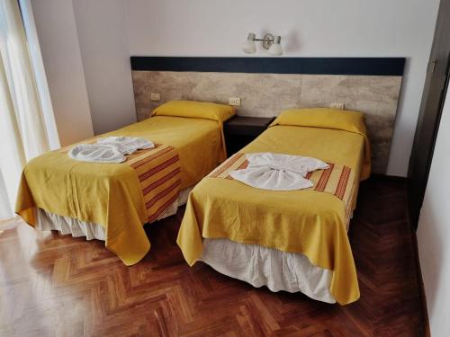 Ένα ή περισσότερα κρεβάτια σε δωμάτιο στο Crystal Hotel