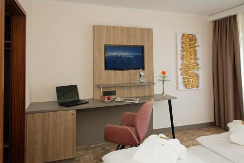 TV o dispositivi per l'intrattenimento presso Thermen-Hotel Rottaler Hof