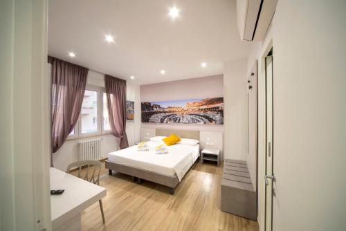 A bed or beds in a room at Italiapartment Vaticano Superior Apartment