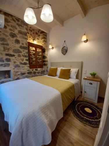 Postel nebo postele na pokoji v ubytování Rodanthe's Guest House