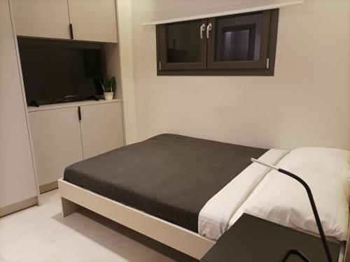 A television and/or entertainment centre at Evripidou Experience - The smart double C