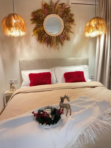 Кровать или кровати в номере Bohemian Boutique Suites