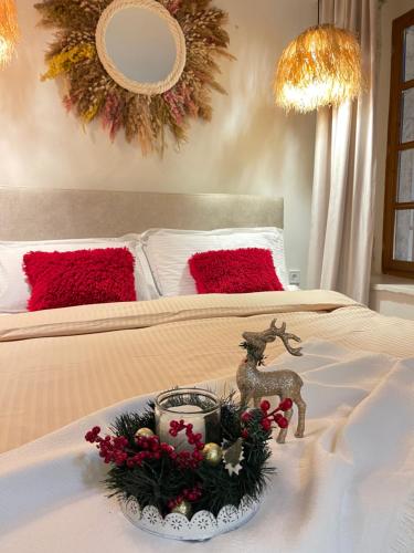 Кровать или кровати в номере Bohemian Boutique Suites