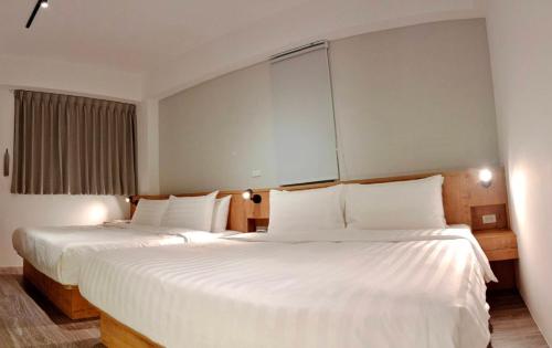 Una cama o camas en una habitación de Ocean Guest House