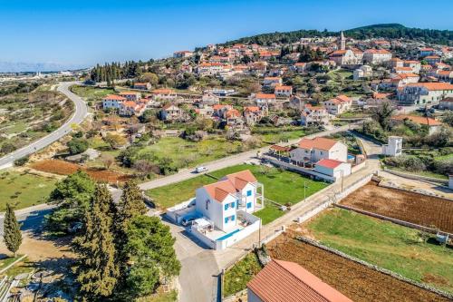 an aerial view of a city with houses at Island Brac - Villa Vita in Nerežišća