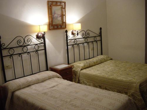 Katil atau katil-katil dalam bilik di Hostal Colon Antequera