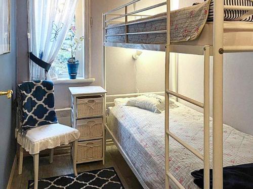 Poschodová posteľ alebo postele v izbe v ubytovaní Holiday home SÖDERKÖPING II