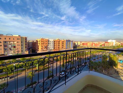 a balcony with a view of a city at Hotel La coline in Beni Mellal