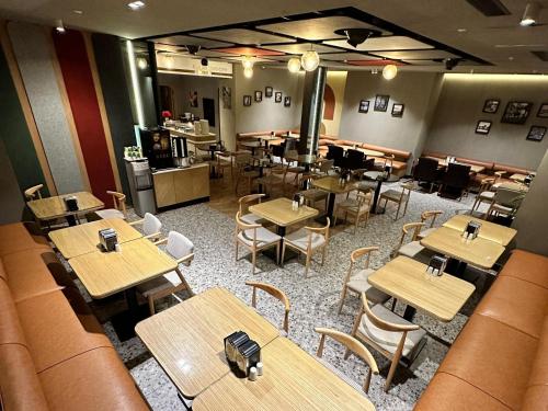 an overhead view of a restaurant with tables and chairs at Edition Old City Hotel in Istanbul