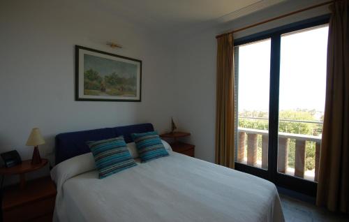 A bed or beds in a room at Lets Holidays Apartment Sea Views in Barcelona