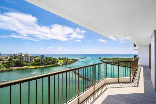 a balcony with a view of the ocean at Bay View in Tweed Heads