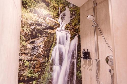 Koupelna v ubytování Hotel Libertas elements pure