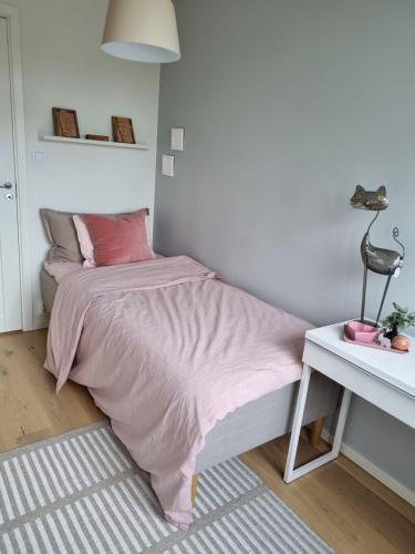 Кровать или кровати в номере The pink room