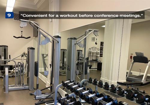 a gym with rows of treadmills and machines at Deluxe Union Square Suites in San Francisco
