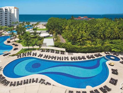 an aerial view of the pool at the resort at 8th Floor Villa Magna Condo in Nuevo Vallarta