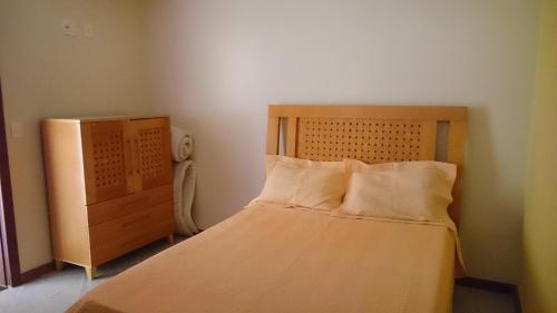 Postel nebo postele na pokoji v ubytování COBERTURA COM CHURRASQUEIRA E PISCINA.