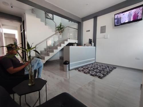 Et tv og/eller underholdning på Hostal El Edén Huaral