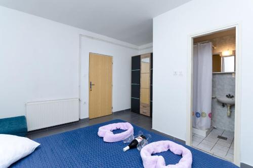 Ένα ή περισσότερα κρεβάτια σε δωμάτιο στο Apartments Mirko R