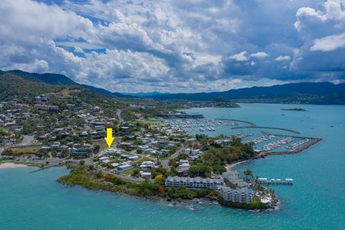 an aerial view of a small island in the water at Whitsunday living on Hillcrest in Airlie Beach