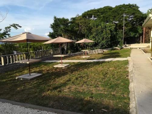 Jardín al aire libre en Happy Sunset's Inn