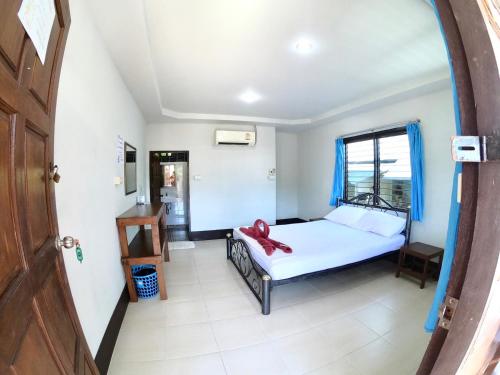 Katil atau katil-katil dalam bilik di JR GYM & Resort
