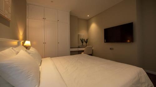 Letto o letti in una camera di Celine Living - Central