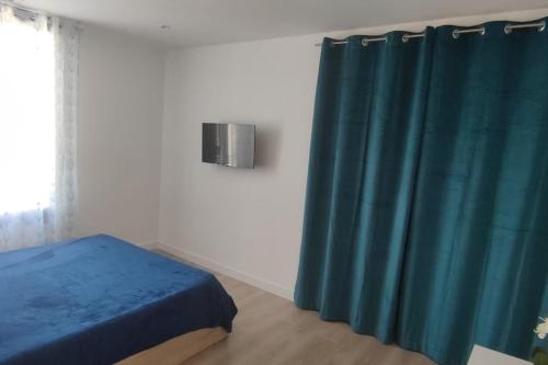 Posteľ alebo postele v izbe v ubytovaní Appartement au centre du monde selon Dali