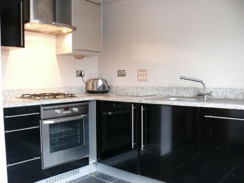 A kitchen or kitchenette at Cheshire Cat 