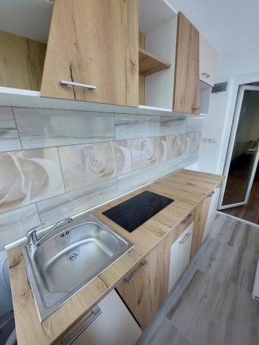 A kitchen or kitchenette at Imobil ultracentral