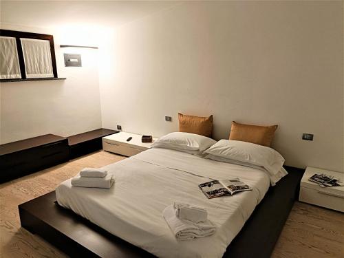 Katil atau katil-katil dalam bilik di Bareggio Comfort Apartment
